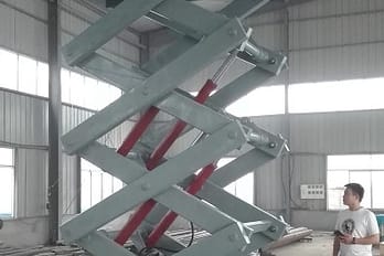 Stationary scissor lift